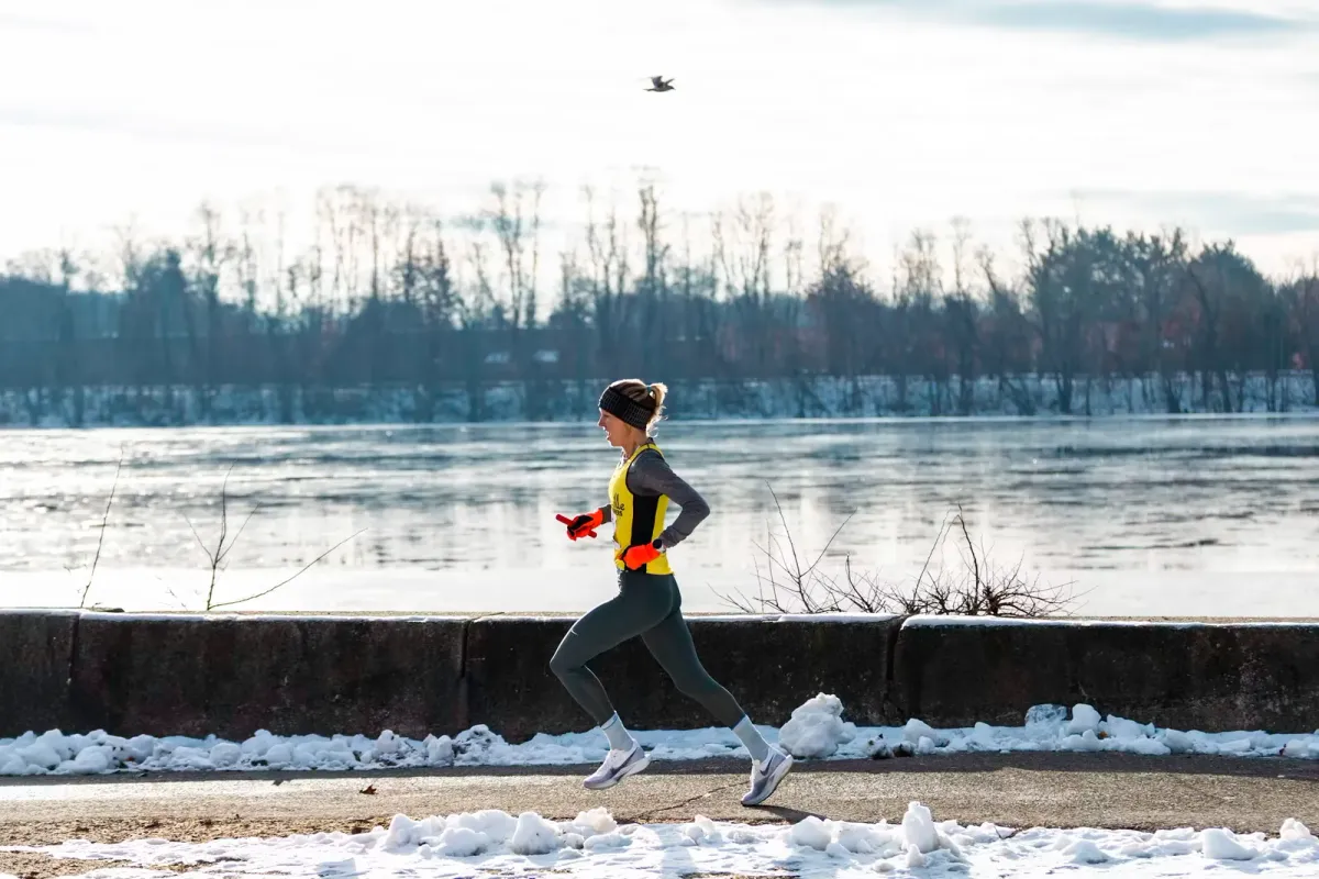 A runner training in bright summer heat
